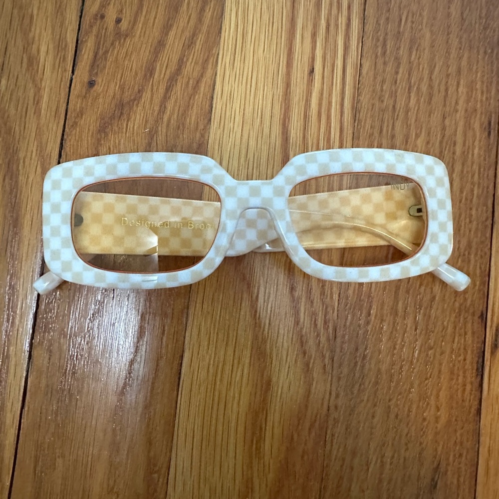 INDY Checkered White Sunglasses with orange lenses